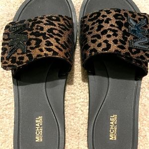 IN SEARCH OF:  Michael kors slides